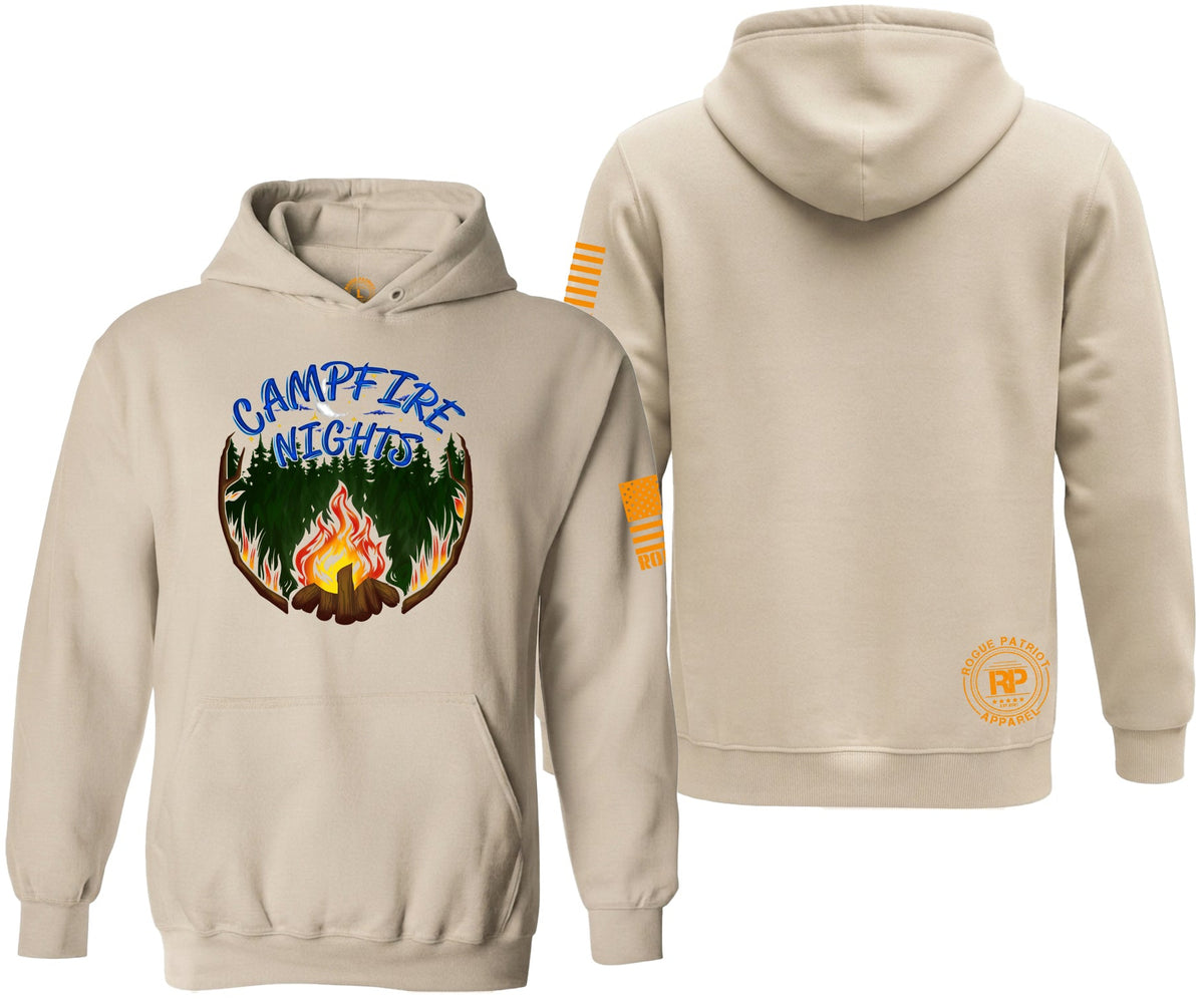 A light beige pullover hoodie shown from both the front and back on a white background. The front features a graphic of a campfire with pine trees and the text 'CAMPFIRE NIGHTS' in blue.