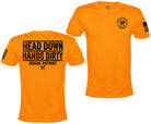 Bright orange short-sleeve t-shirt shown from both front and back on a white background. The front features a circular black 'Rogue Patriot' logo on the left chest, and the back features bold black text reading 'HEAD DOWN HANDS DIRTY ROGUE PATRIOT' with a small crossed-tool graphic below.