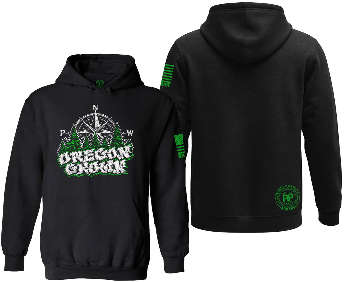 Black pullover hoodie shown from the front and back on a white background. The front features a green and white 'Oregon Grook' graphic with a compass and pine trees, and the back has a green circular logo on the lower back and a green striped patch on the sleeve.